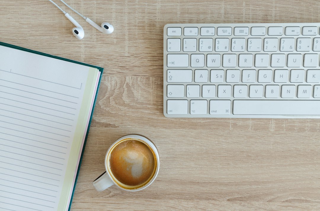 Tidy desk workspace with a cup of coffee