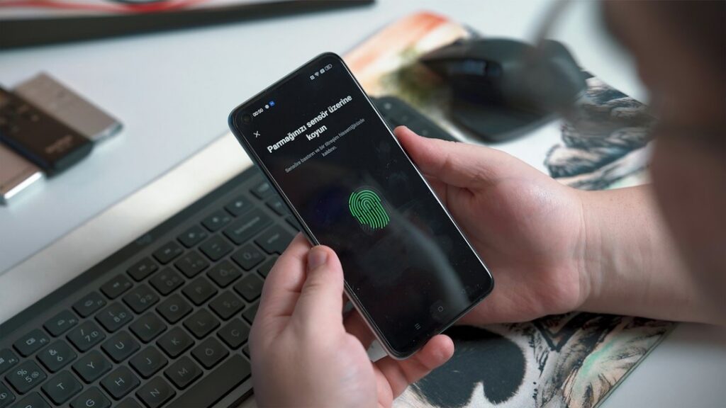 Finger on a smartphone fingerprint sensor