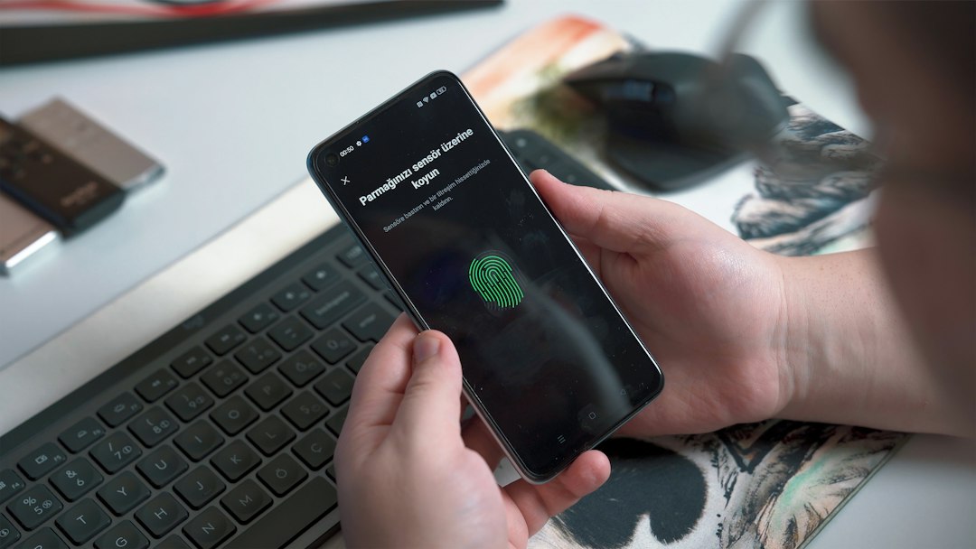 Finger on a smartphone fingerprint sensor